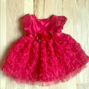 Red dress with floral embellished skirt